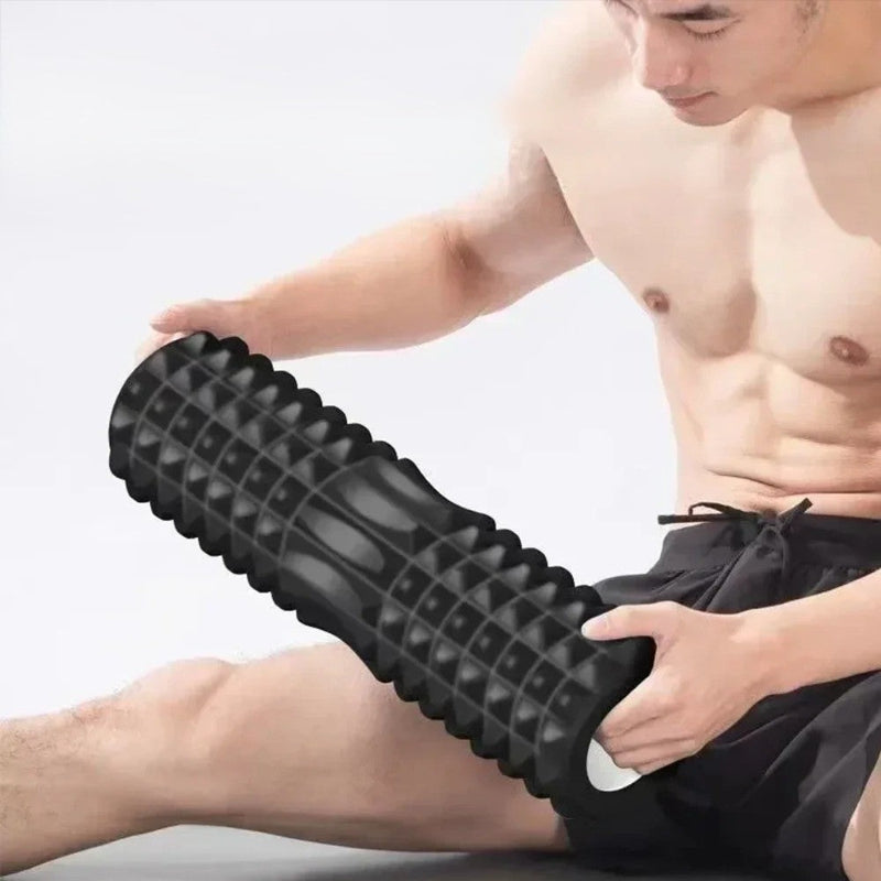 homme tenant rouleaux de massage