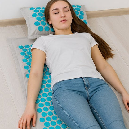 femme detendue sur tapis dacupression