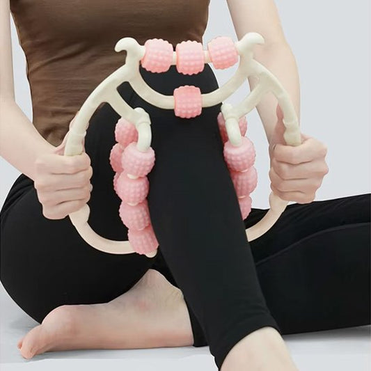femme massant jambe avec rouleaux de massage