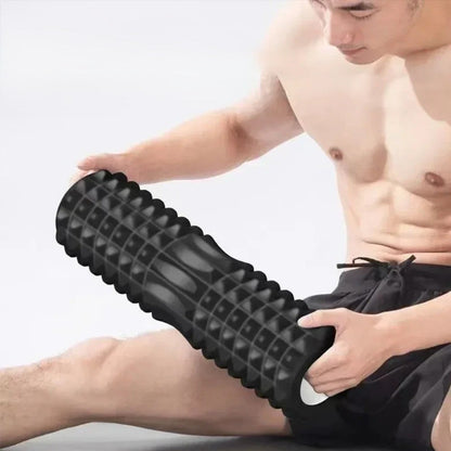 homme tenant rouleaux de massage
