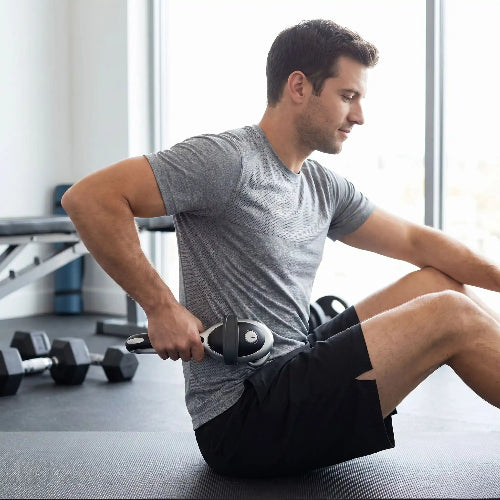 recuperation sportive avec appareil de massage dos